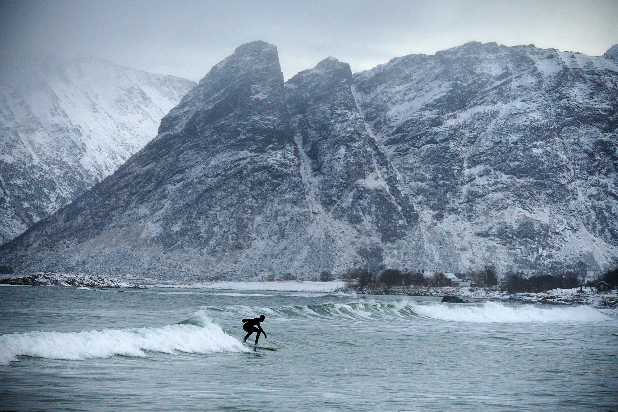 Surfing on Lofoten islands, even in the winter